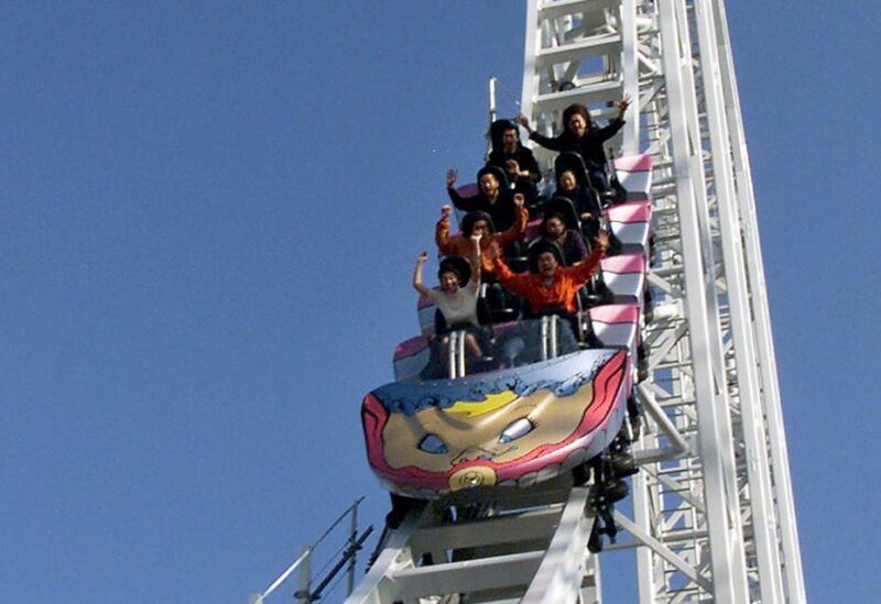 File photo of people riding the Do-Dodonpa rollercoaster at Fuji Q Highland amusement park in Fuji-Yosida, west of Tokyo, December 3, 2001. (Reuters)