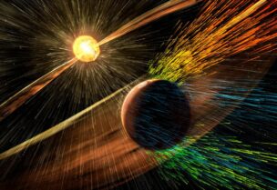 An undated artist's rendering depicts a solar storm hitting Mars and stripping ions from the planet's upper atmosphere in this NASA handout released November 5, 2015. (Reuters)