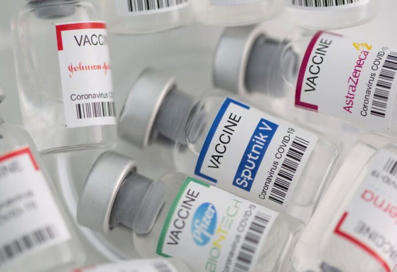 Vials labelled Moderna, AstraZeneca, Pfizer - Biontech, Johnson&Johnson, Sputnik V coronavirus disease (COVID-19) vaccine are seen in this illustration picture taken May 2, 2021. (File photo: Reuters)