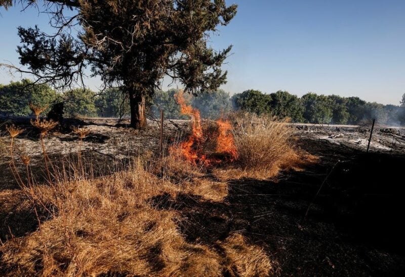 A field on fire is seen after Palestinians in Gaza sent incendiary balloons over the border between Gaza and Israel, Near Nir Am. (File photo: Reuters)