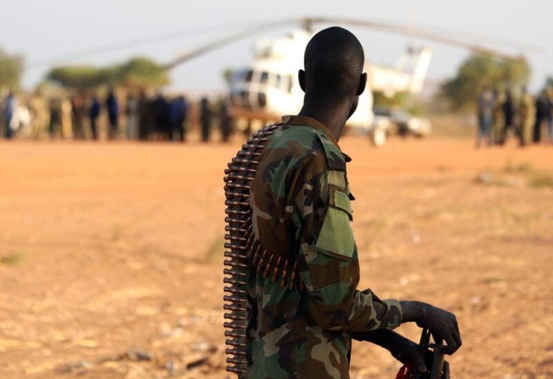 A file photo shows an armed member of the South Sudanese security forces during a ceremony marking the restarting of crude oil pumping at the Unity oil fields in South Sudan, on January 21, 2019. (Reuters)