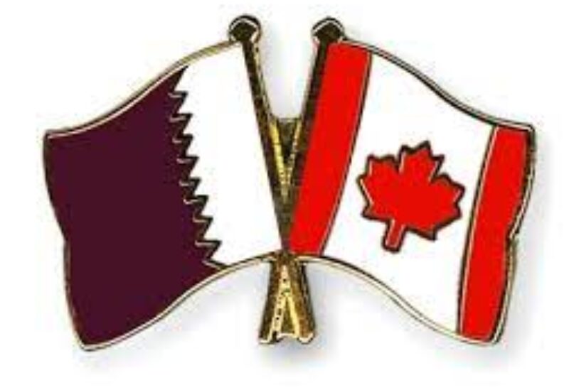 Qatari and Canadian flags
