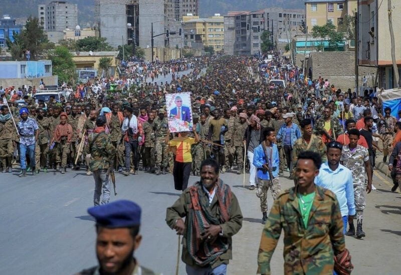 In this file photo on July 2, 2021, captured members of the Ethiopian National Defense Force are marched through the streets to prison under guard by Tigray Forces as hundreds of residents look on, in Mekele, in the Tigray region of northern Ethiopia.(AP)