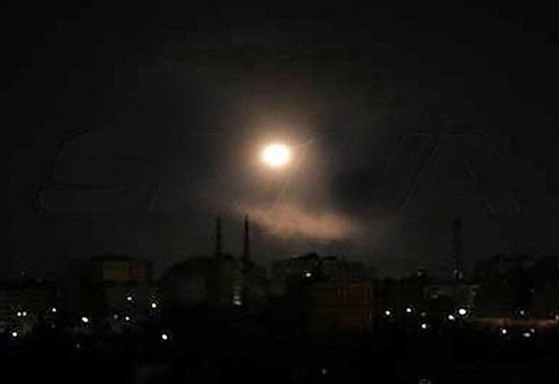 A handout picture released by the official Syrian Arab News Agency (SANA) on August 20, 2021 shows a light spot over the capital Damascus late on August 19, 2021. (AFP)
