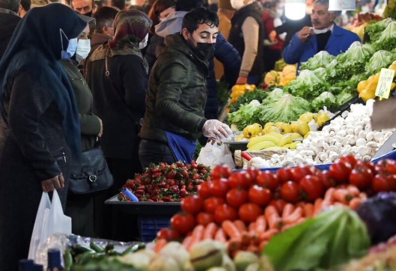 People wearing protective masks shop at a local market, amid the coronavirus disease (COVID-19) outbreak in Ankara, Turkey February 24, 2021. (File photo: Reuters)