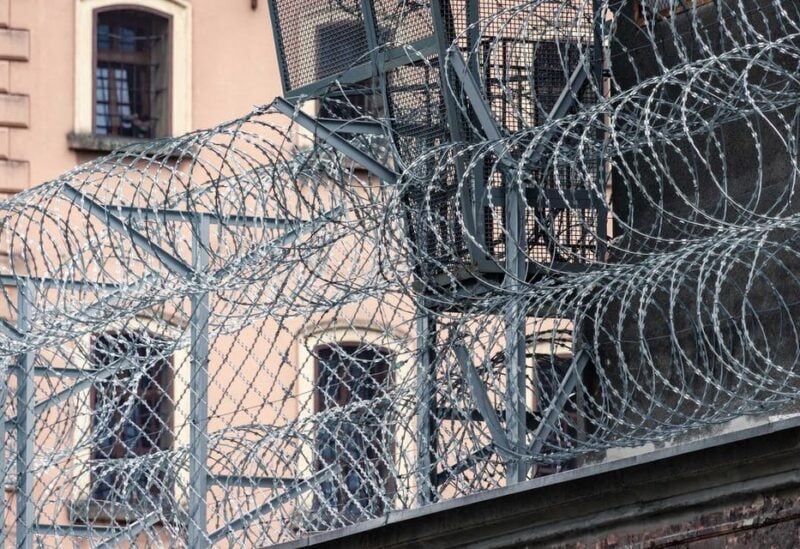 File photo of the outside of a prison. (Unsplash, Pawel Czerwinski)