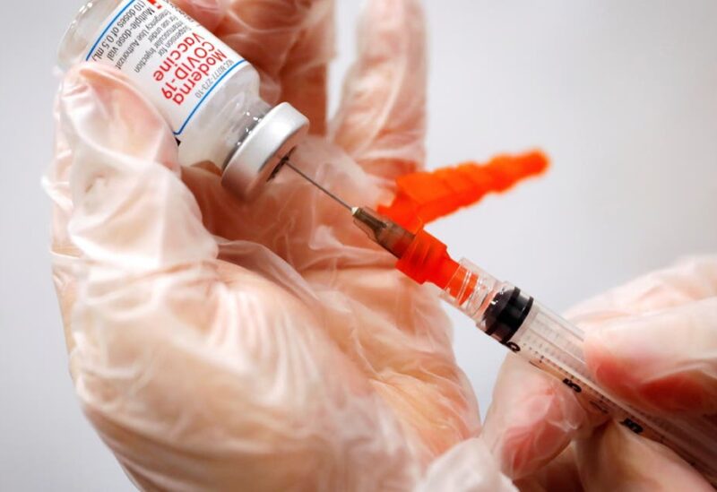 A healthcare worker prepares a syringe with the Moderna COVID-19 Vaccine at a pop-up vaccination site operated by SOMOS Community Care during the COVID-19 pandemic in Manhattan in New York City, New York, US, January 29, 2021. (File photo: Reuters)