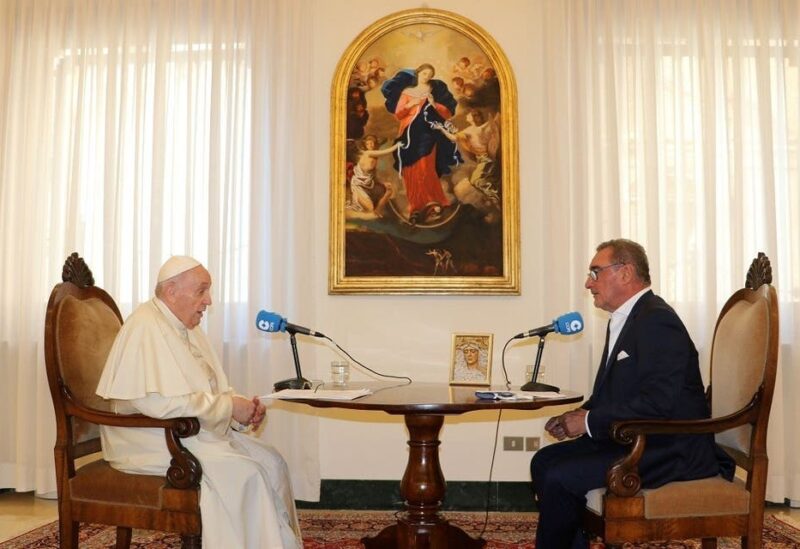 Pope Francis and journalist Carlos Herrera talk during an interview with Spanish radio station COPE at the Vatican City in this picture released on September 1, 2021. (Reuters)