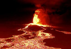 Screen grab from a video taken by a night drone shows a volcano erupting and tongues of lava in La Palma, Spain September 22, 2021. (Reuters)