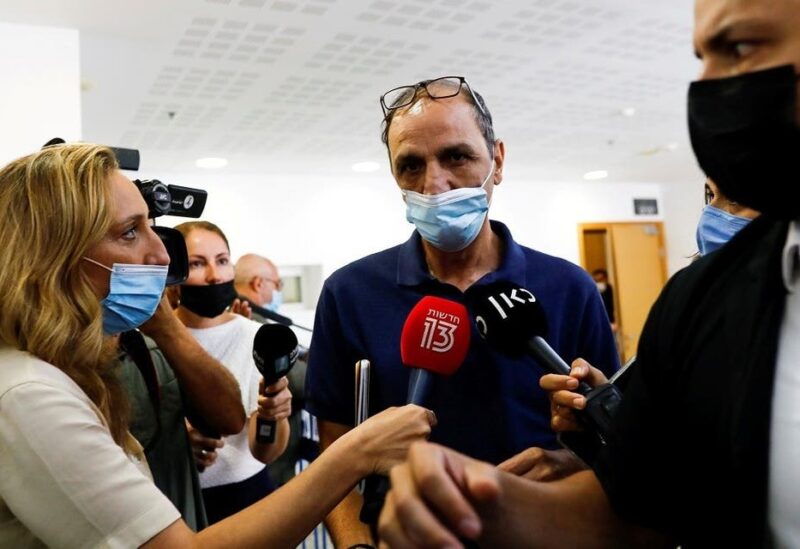 Shmuel Peleg, the grandfather of Eitan Biran, a six-year-old boy who was the only survivor of an Italian cable car disaster and is now at the centre of a custody battle, declines to speak to members of the media after a court hearing in Tel Aviv, Israel, on September 23, 2021. (Reuters)