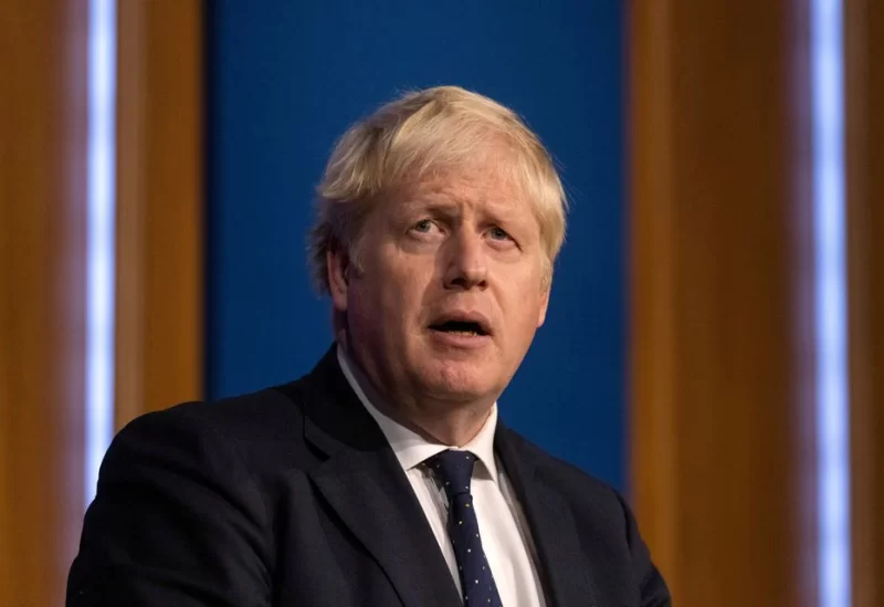 Britain's Prime Minister Boris Johnson holds a news conference on a winter COVID-19 plan in the Downing Street Briefing Room in London, Britain September 14, 2021. Dan Kitwood/Pool via REUTERS/File Photo