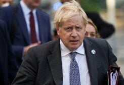 British PM Boris Johnson walks outside UN headquarters, Sept. 20, 2021. (Reuters)