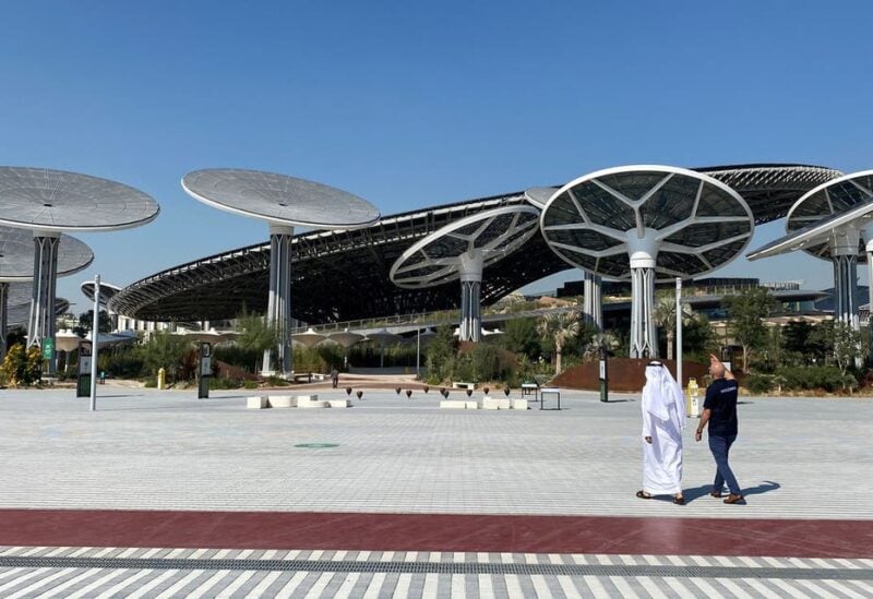 People walk at the site of Dubai Expo 2020 in Dubai. (Reuters)