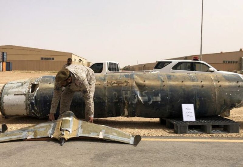 A projectile and a drone launched at Saudi Arabia by the Houthis are displayed at a Saudi military base