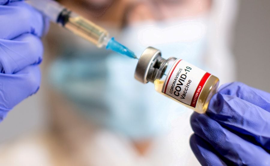 A nurse prepares a dose of the Moderna coronavirus disease (COVID-19) vaccine at the Glangwili General Hospital in Carmarthen, Wales, Britain