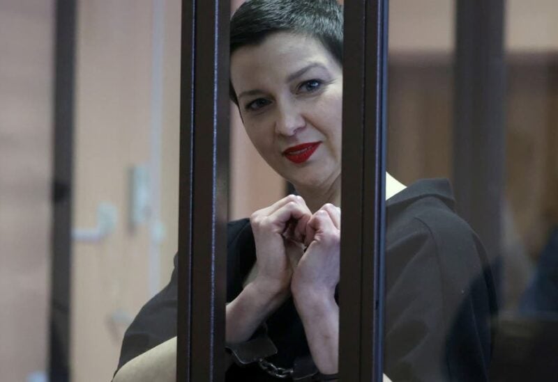 Belarusian opposition politician Maria Kolesnikova, charged with extremism and trying to seize power illegally, gestures inside a defendants' cage as she attends a court hearing in Minsk, Belarus September 6, 2021. (Reuters)