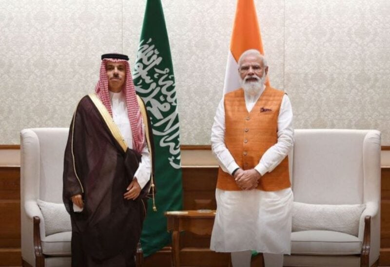 Saudi Arabia's Prince Faisal bin Farhan and India's Narendra Modi.