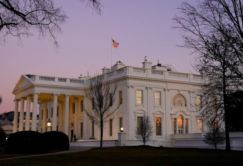 The White House is seen at sunset on US President Joe Biden's first day in office, Jan. 20, 2021. (Reuters)