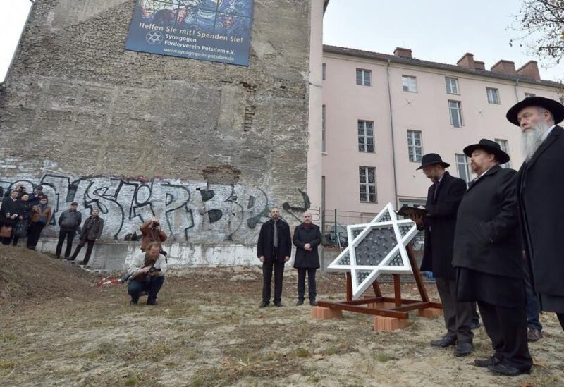 Residents of Potsdam, eastern Germany, attend a ceremony at the construction site of a new synagogue on November 9, 2018, the 80th anniversary of the Kristallnacht Nazi pogrom. (File photo: AFP)