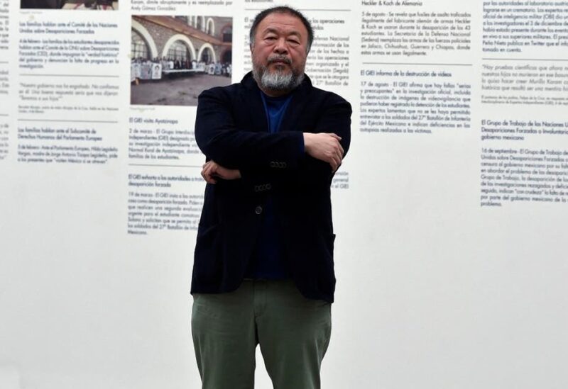 Chinese contemporary artist and activist Ai Weiwei poses in front of his new exhibition at the University Museum of Contemporary Art (MUAC) in Mexico City on April 11, 2019. (AFP)