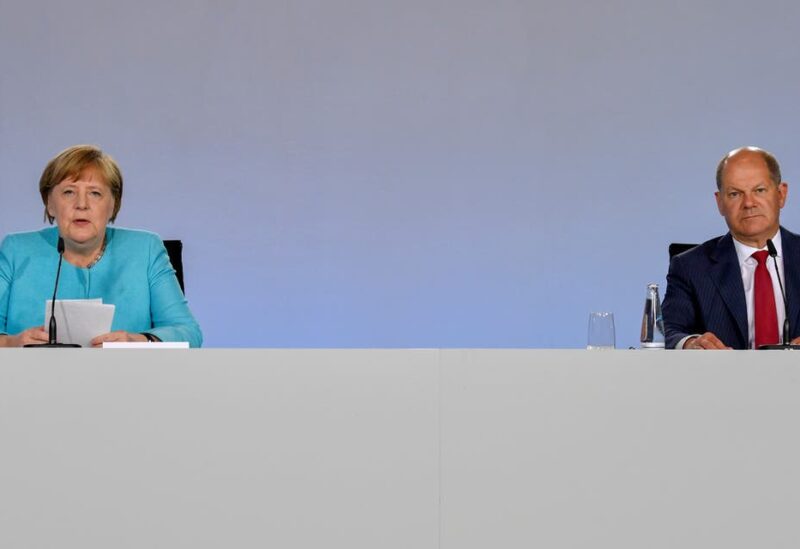 German Chancellor Angela Merkel and German Finance Minister and Vice-Chancellor Olaf Scholz address a news conference after coalition meetings over stimulus measures to reboot post-coronavirus economy, at the Chancellery in Berlin, Germany June 3, 2020. (File photo: Reuters)