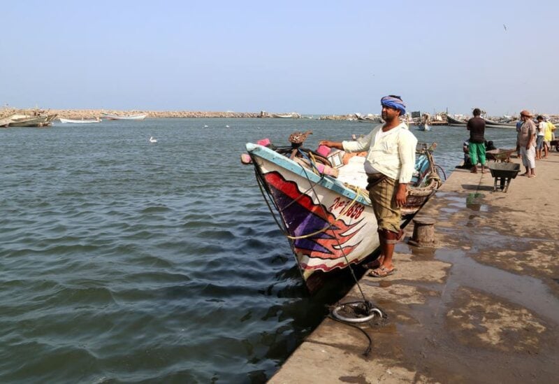 Fisherman Muhammad Hindi Burmi looks at the sea as he stands by a fishing boat at the port of Hodeidah, Yemen April 17, 2019. Picture taken April 17, 2019. (File photo: Reuters)