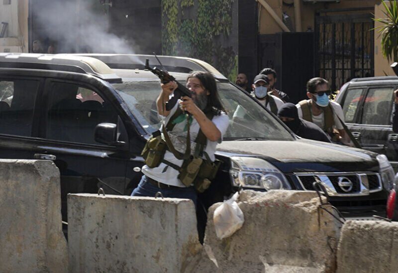 Supporters of Hezbollah militia during Tayouneh clashes