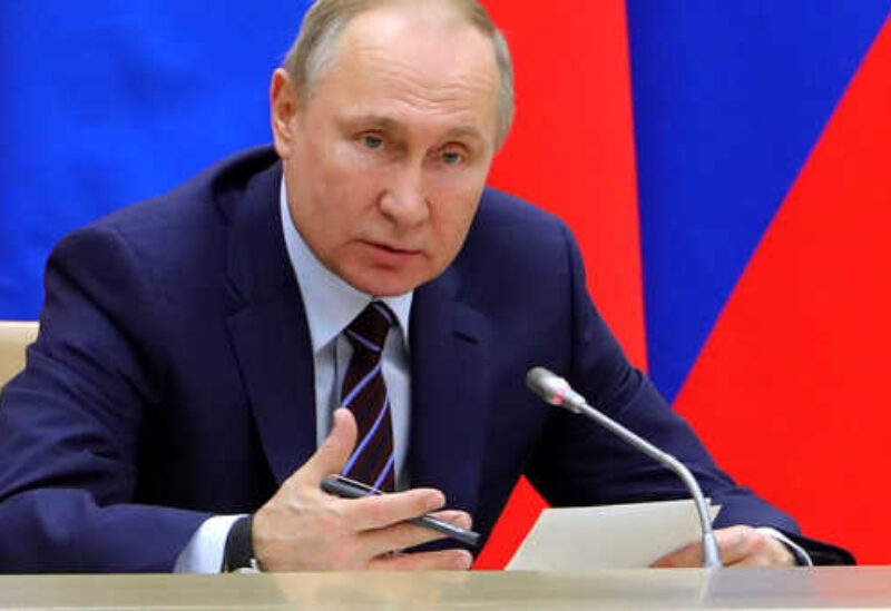 Russian President Vladimir Putin speaks as he chairs a meeting on drafting constitutional changes at the Novo-Ogaryovo residence outside Moscow, Russia, Thursday, Jan. 16, 2020. Putin proposed a set of constitutional amendments that could keep him in power well past the end of his term in 2024.(Mikhail Klimentyev, Sputnik, Kremlin Pool Photo via AP)