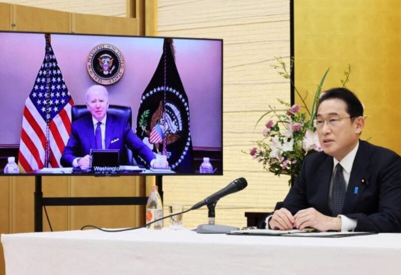 Japan's Prime Minister Fumio Kishida attends a virtual meeting with the U.S. President Joe Biden at his official residence in Tokyo, Japan January 21, 2022, in this photo released by Japan's Cabinet Public Relations Office via Kyodo. Japan's Cabinet Public Relations Office via Kyodo/via REUTERS Mandatory credit Kyodo/via REUTERS ATTENTION EDITORS - THIS IMAGE WAS PROVIDED BY A THIRD PARTY. MANDATORY CREDIT. JAPAN OUT. NO COMMERCIAL OR EDITORIAL SALES IN JAPAN.