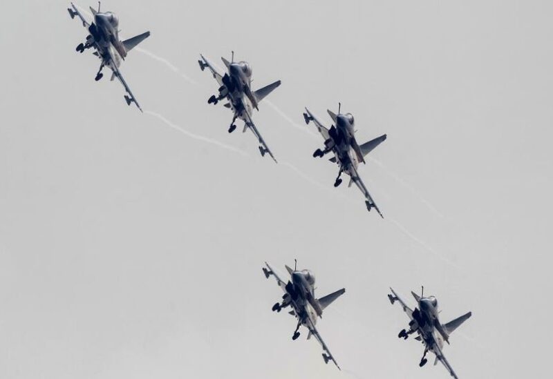 J-10 fighter jets from the August 1st Aerobatics Team of the People's Liberation Army Air Force perform during the 10th China International Aviation and Aerospace Exhibition in Zhuhai, Guangdong province
