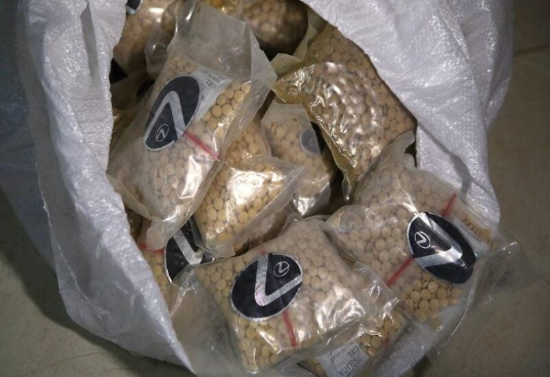 File photo of confiscated pills displayed at the police anti-narcotics unit headquarters in Amman