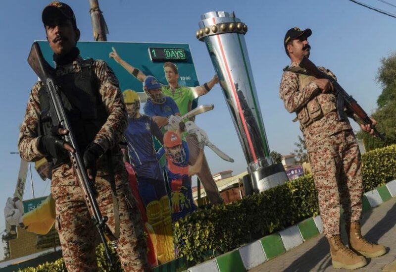 Paramilitary soldiers stand guard outside the National Cricket Stadium in Karachi
