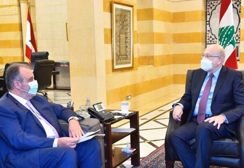 Prime Minister Najib Mikati and Industry Minister Georges Boushikian