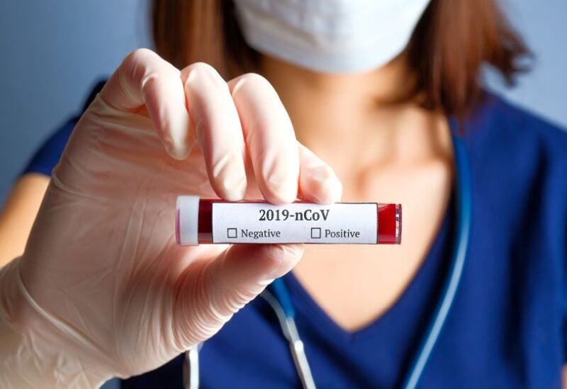 Test tube with Corona virus name label