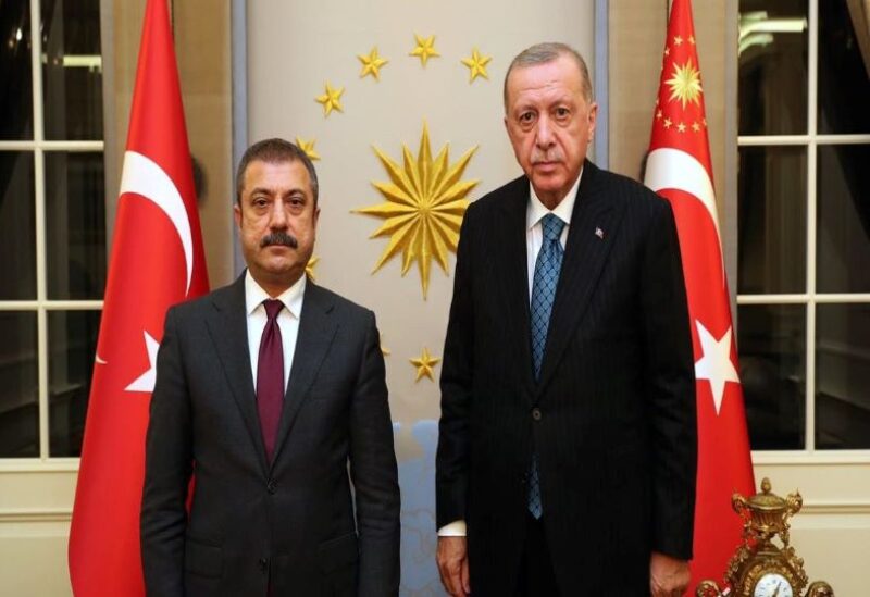 Turkey Central Bank governor Sahap Kavcioglu (left) with President Recep Erdogan (right)