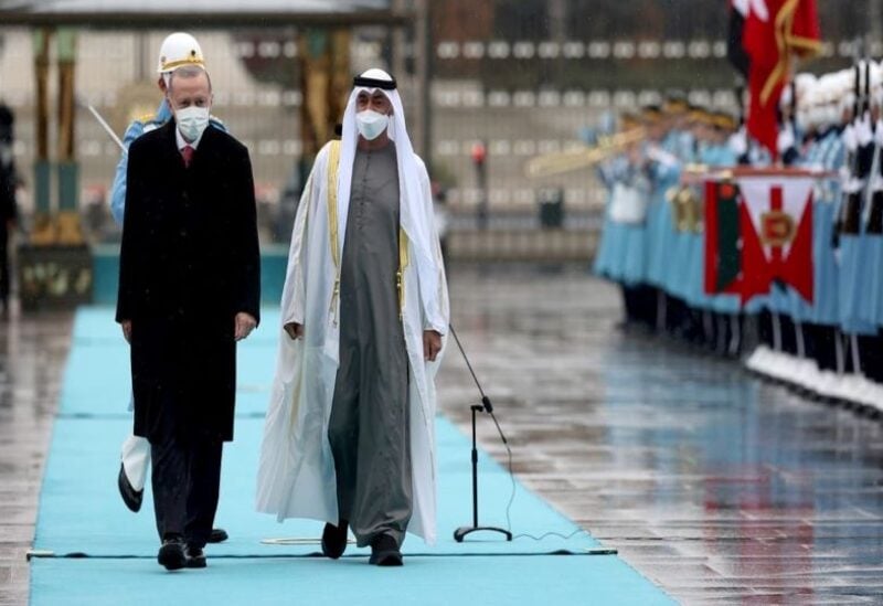 Turkish President Tayyip Erdogan and Abu Dhabi Crown Prince Sheikh Mohammed bin Zayed Al Nahyan review a guard of honor, in Ankara. (Reuters)