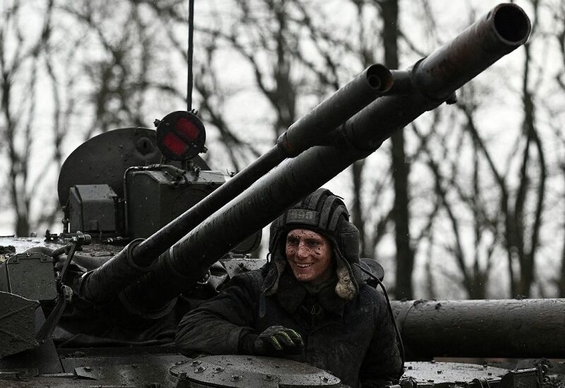 A Russian service member is seen on a BMP-3 infantry fighting vehicle during drills