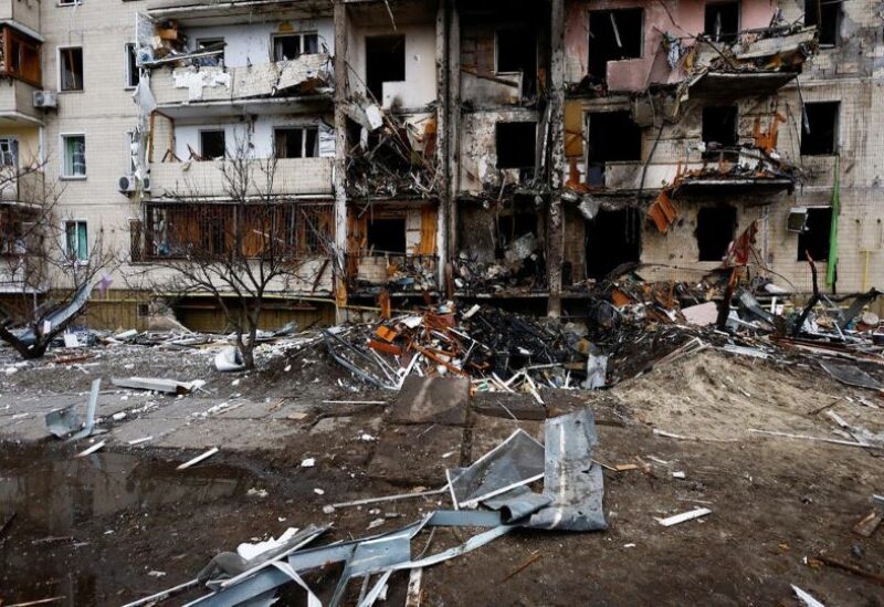 A damaged residential building is seen, after Russia launched a massive military operation against Ukraine, in Kyiv