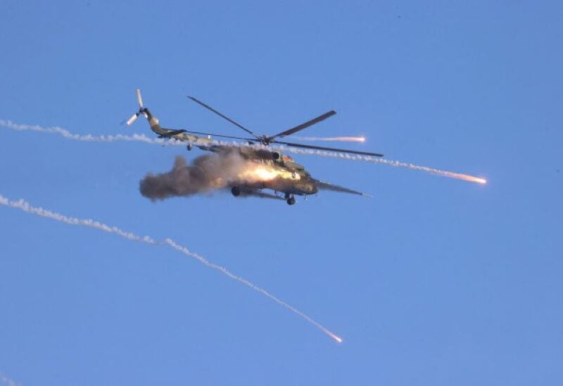 A helicopter fires during military exercises held by the armed forces of Russia and Belarus