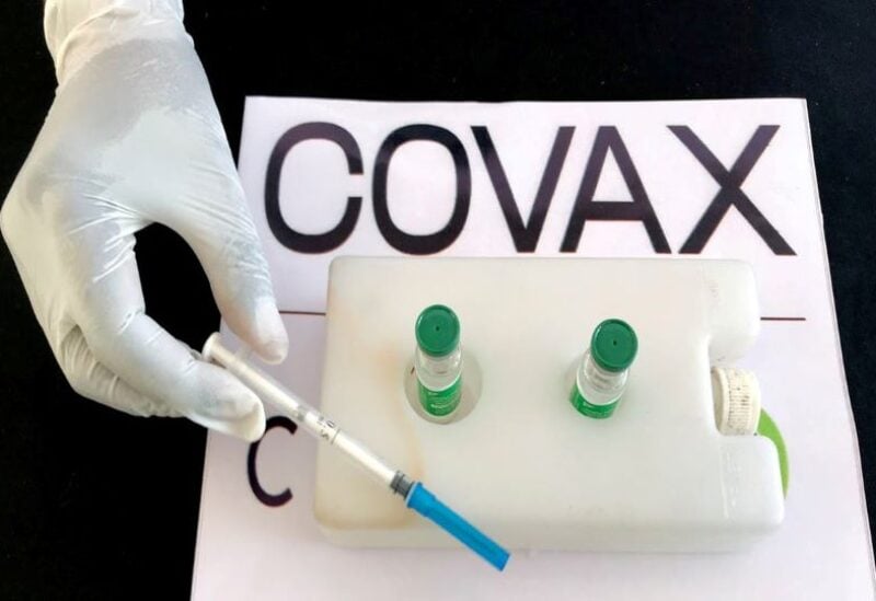 A nurse prepares to administer the AstraZeneca/Oxford vaccine under the COVAX scheme against the coronavirus disease