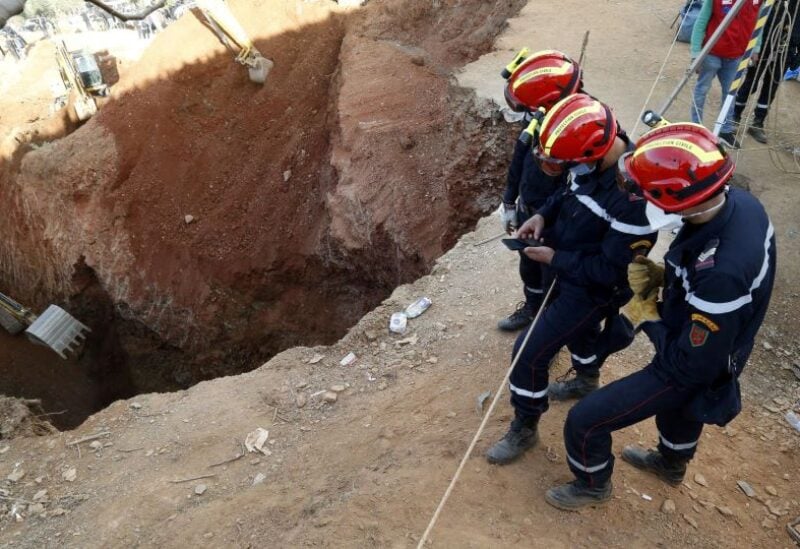 Members of the Moroccan civil defence work to rescue the five-year-old boy Rayan, who is trapped in a deep well for more than 40 hours,
