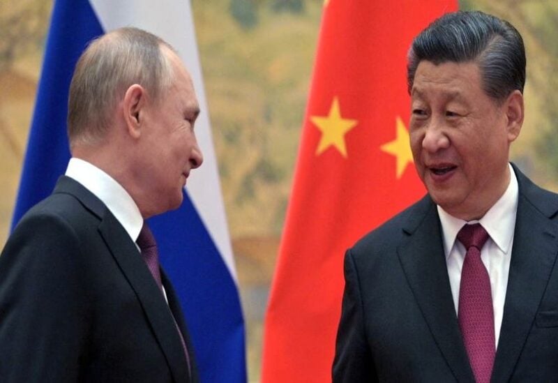 Russian President Vladimir Putin attends a meeting with Chinese President Xi Jinping in Beijing, China