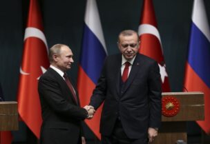 Russian President Vladimir Putin meets with his Turkish counterpart Recep Tayyip Erdogan