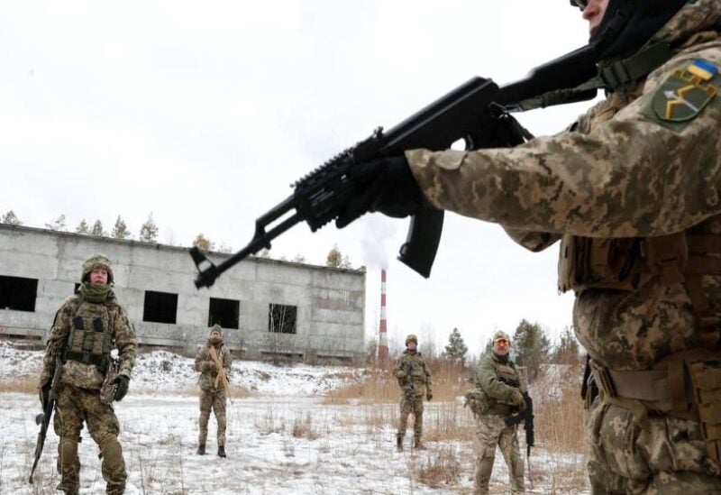 Security personnel of Pakistan's Frontier Corps stand guard in a bunker near the Badini Trade Terminal Gateway,