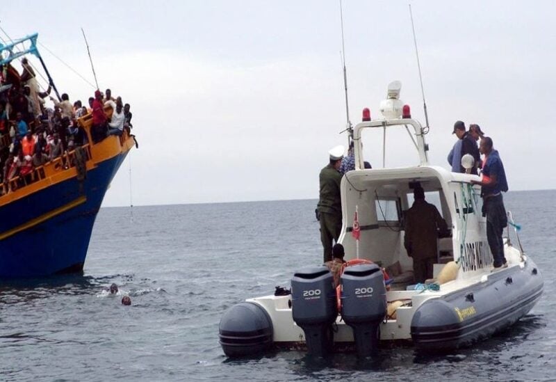 Tunisian coastguards rescue African migrants stranded on a boat coming from Libya, near Sfax, on the Tunisian coas