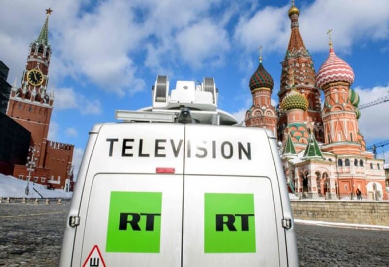 Vehicles of Russian state-controlled broadcaster Russia Today (RT) are seen near the Red Square in central Moscow, Russia