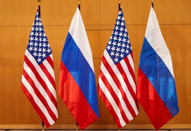 Russian and U.S. flags are pictured before talks between Russian Deputy Foreign Minister Sergei Ryabkov and U.S. Deputy Secretary of State Wendy Sherman at the United States Mission in Geneva, Switzerland January 10, 2022.