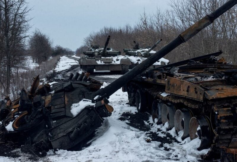 A charred Russian tank and captured tanks are seen, amid Russia's invasion of Ukraine, in the Sumy region, Ukraine, March 7, 2022.