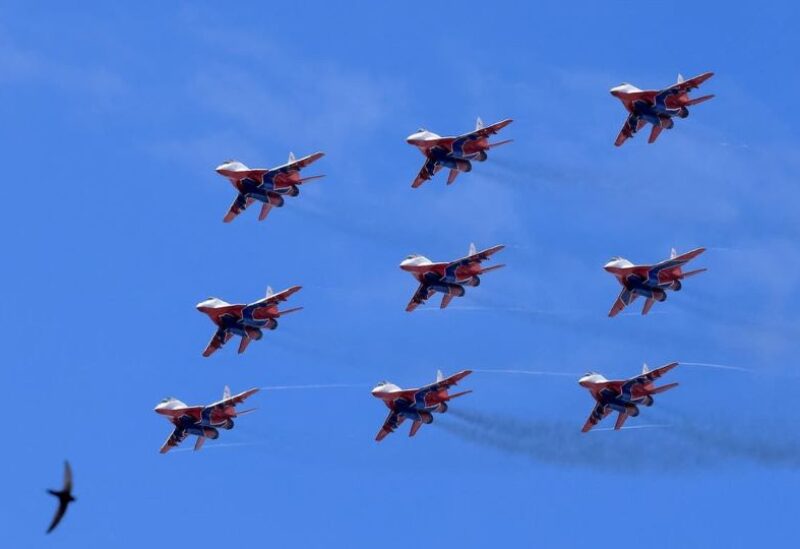 Russian MiG-29 jet fighters of the Strizhi (Swifts) aerobatic team perform during the MAKS 2021 air show in Zhukovsky, outside Moscow, Russia