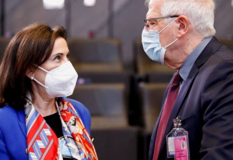 Spain's Defence Minister Margarita Robles talks with European Union High Representative for Foreign Affairs and Security Policy Josep Borrell Fontelles during a NATO Defence Ministers meeting